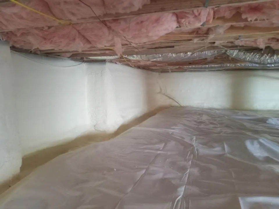 Crawl space encapsulation with closed-cell spray foam for Storm Damage Roof Repair in Shelburne